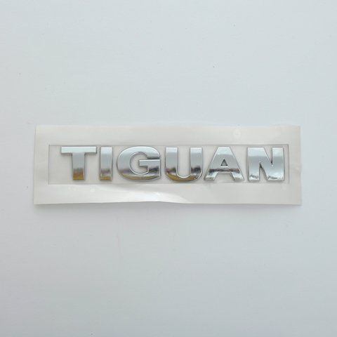 Емблема - напис "TIGUAN" (рівна) скотч 168х26 мм 2008-2012 (wiwo 5NO 853 687A 739) &mdash; основне фото товару