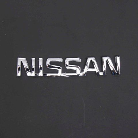 Эмблема - надпись "NISSAN" 120х22 мм скотч 3M &mdash; основное фото товара